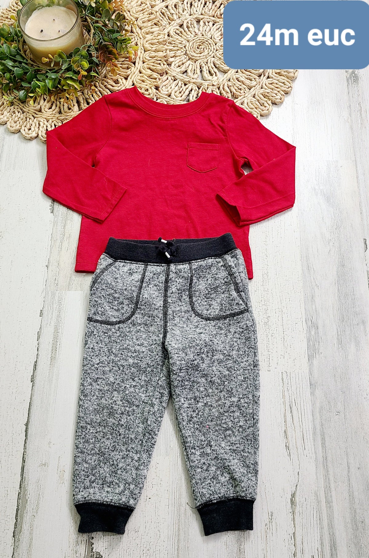 red top and gray joggers