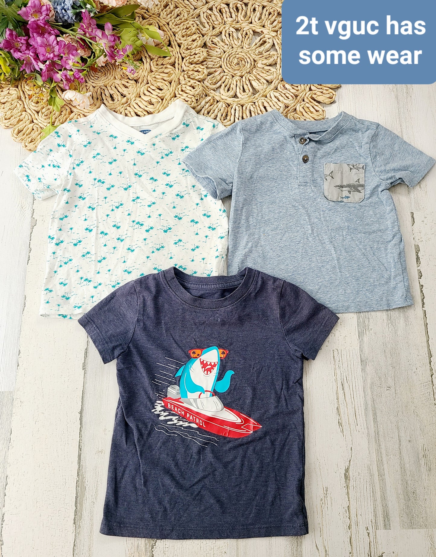 3 blue graphic tees