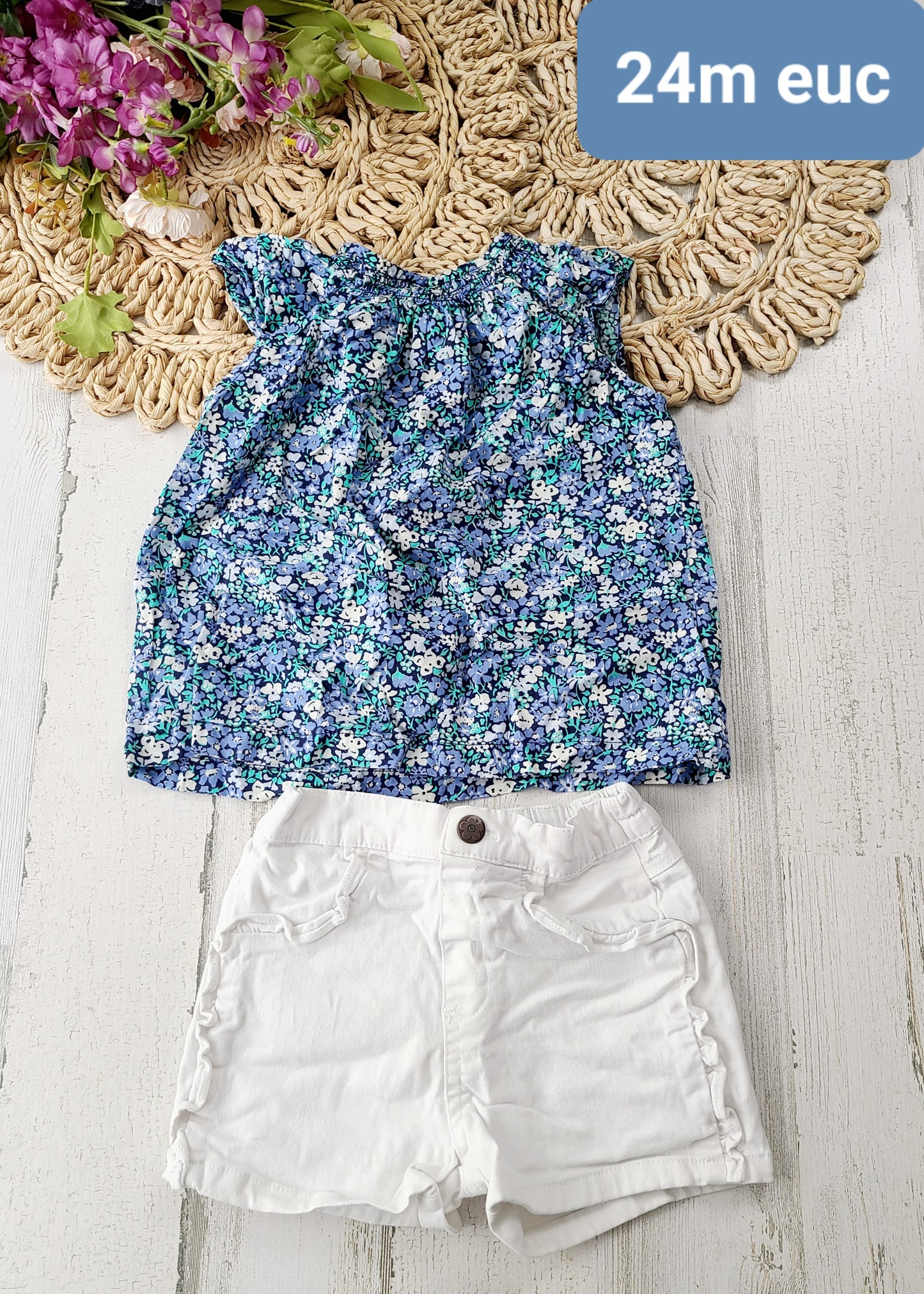 white shorts blue floral top