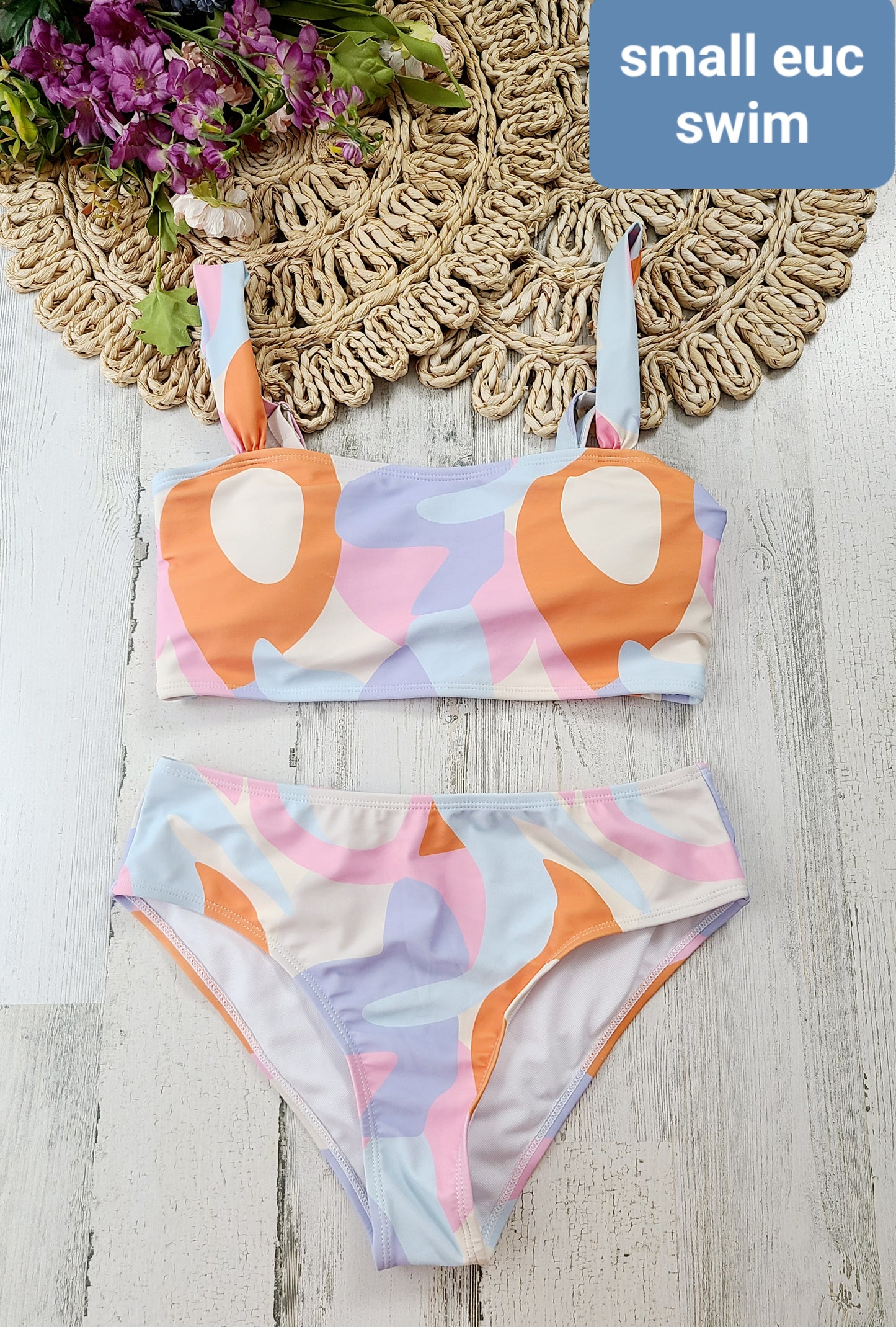 small orange, pink, blue, purple swim