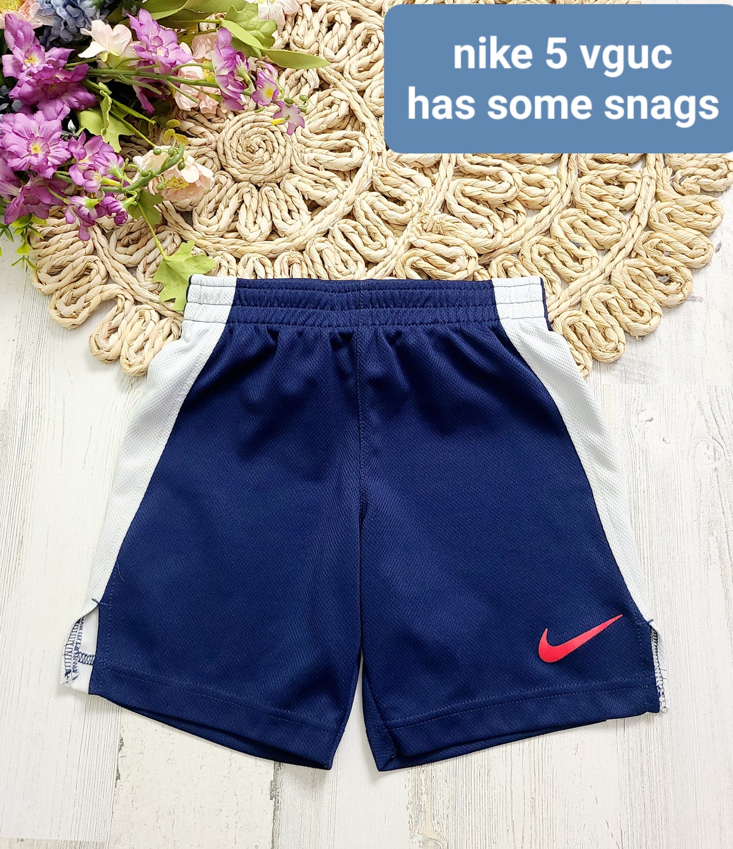 navy white nike shorts red swoosh