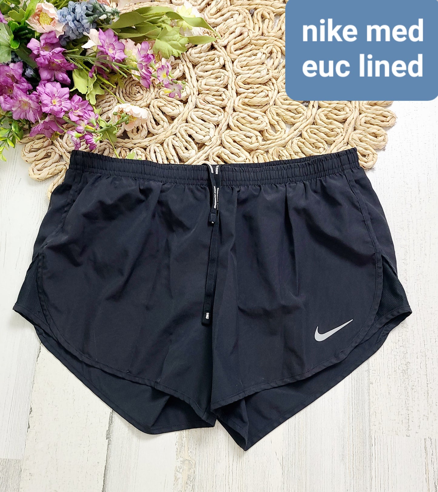 black lined medium nike shorts