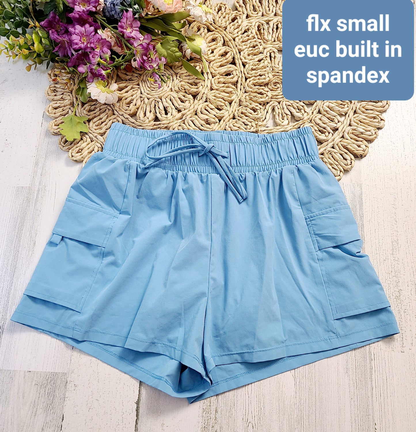 flx blue shorts with spandex inside