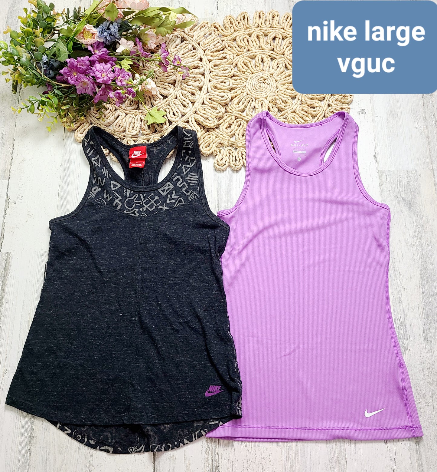 nike black and purple tanks