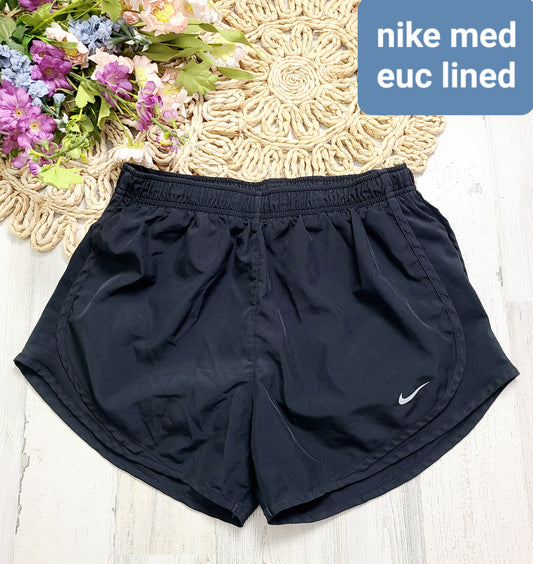 black lined womens nike shorts medium