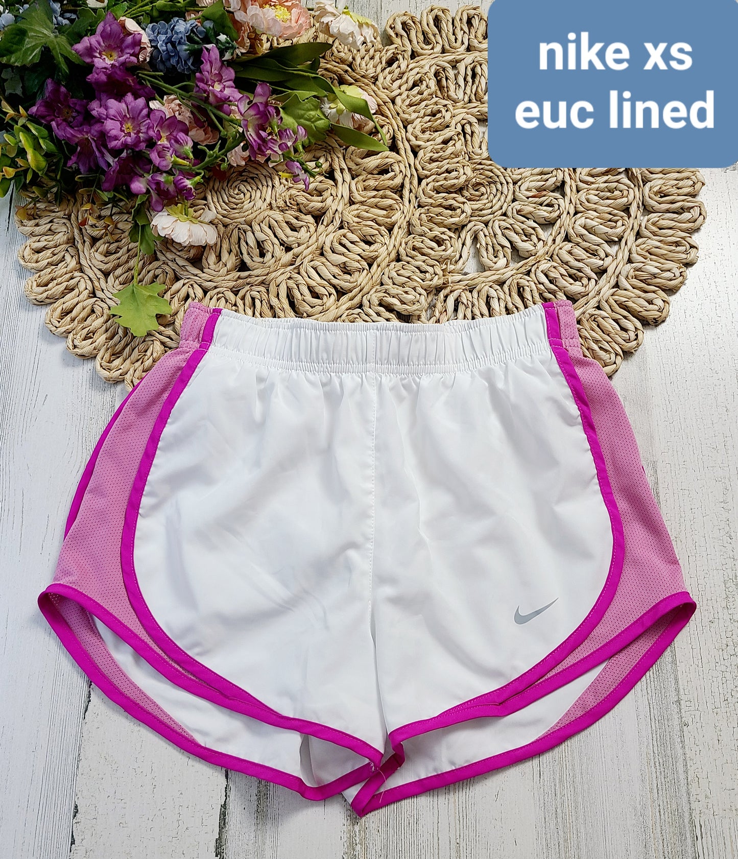 white and pink nike xs line shorts