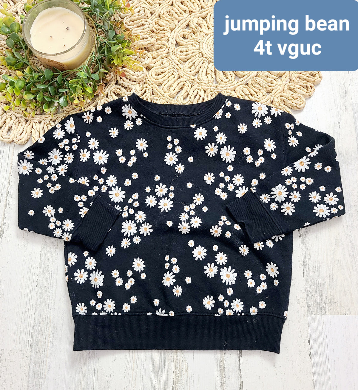 white daisy on black jumping bean 4t