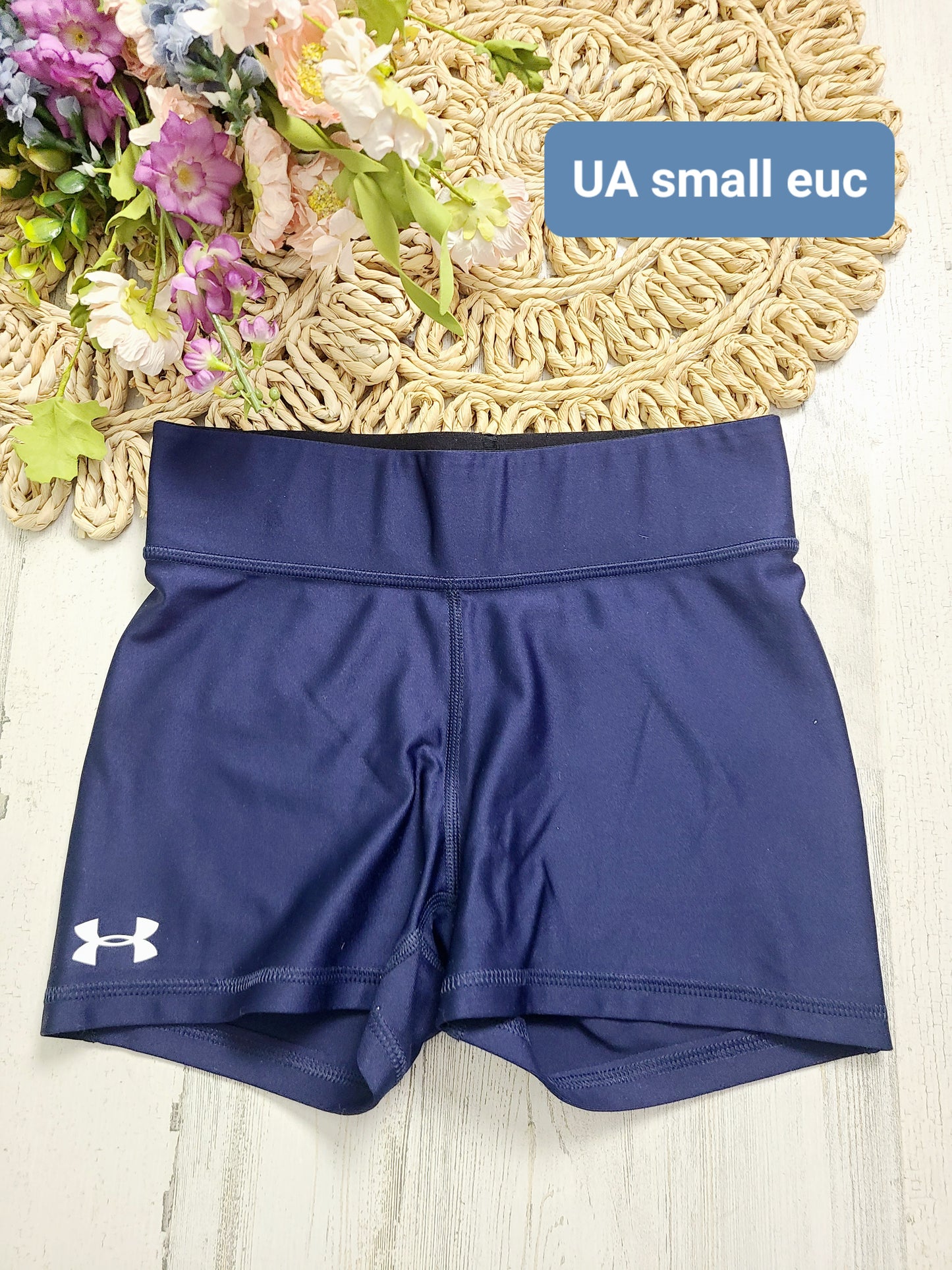 ua shiny navy spandex shorts