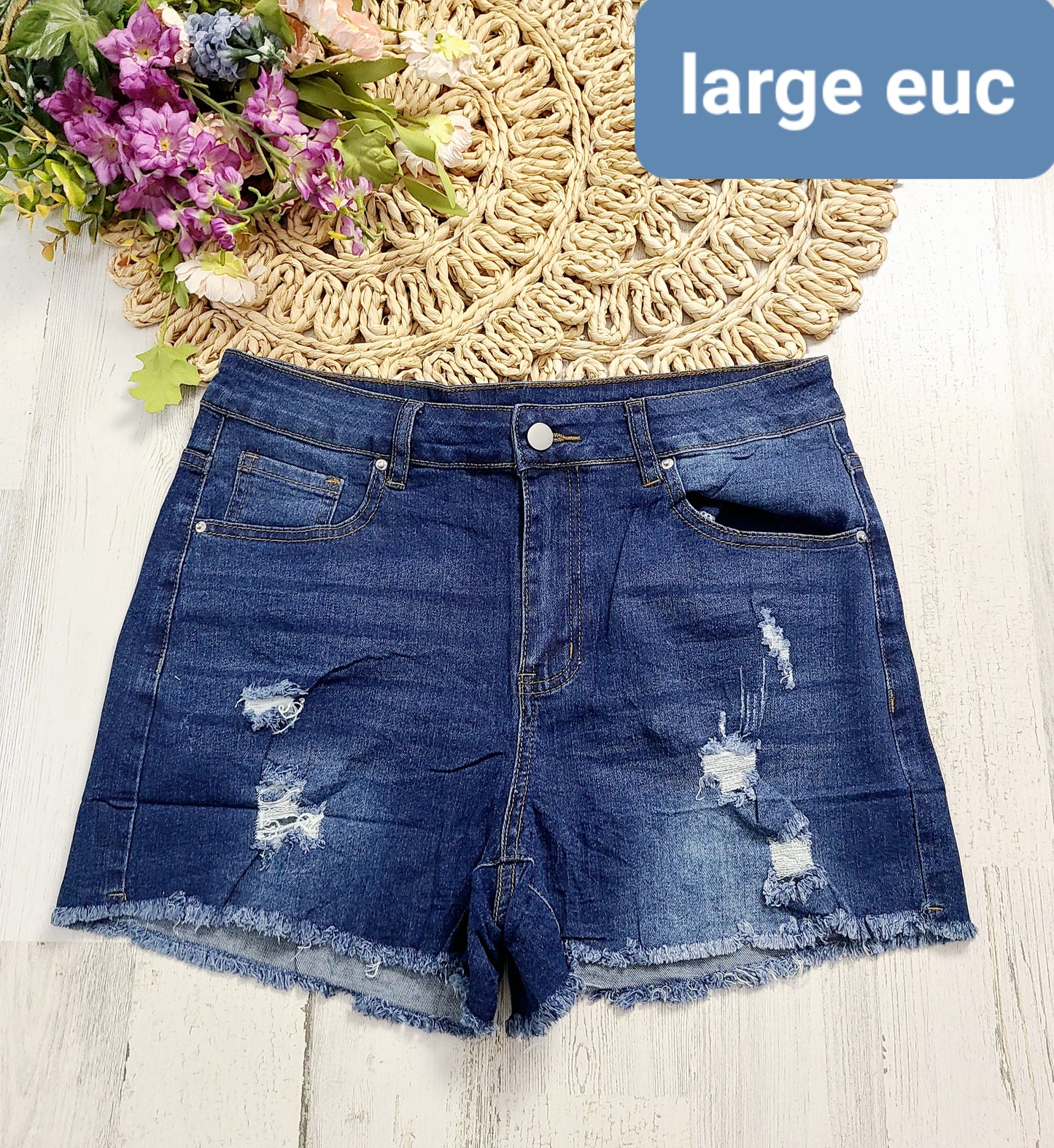 large distressed raw hem shorts
