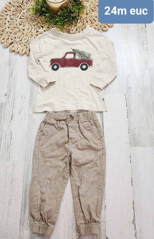 tree in truck top and khaki pants