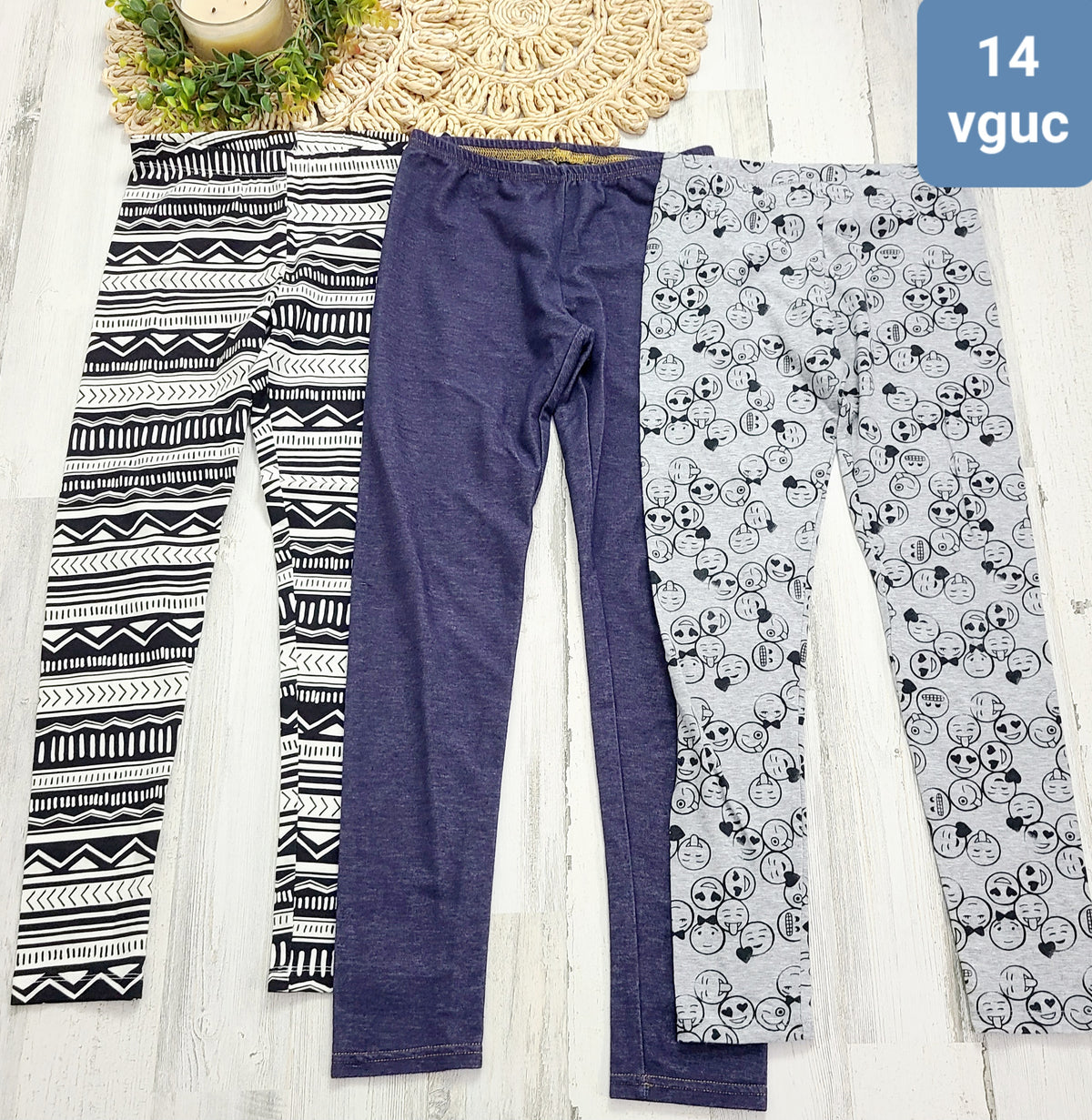 3 pairs of leggings one is emojis 14y