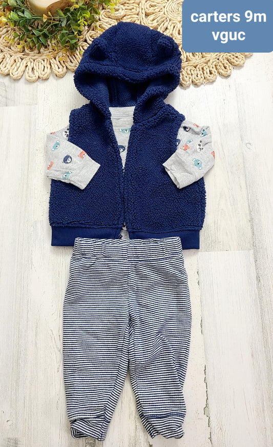 sherpa vest over animals onesie and stripe pants carters