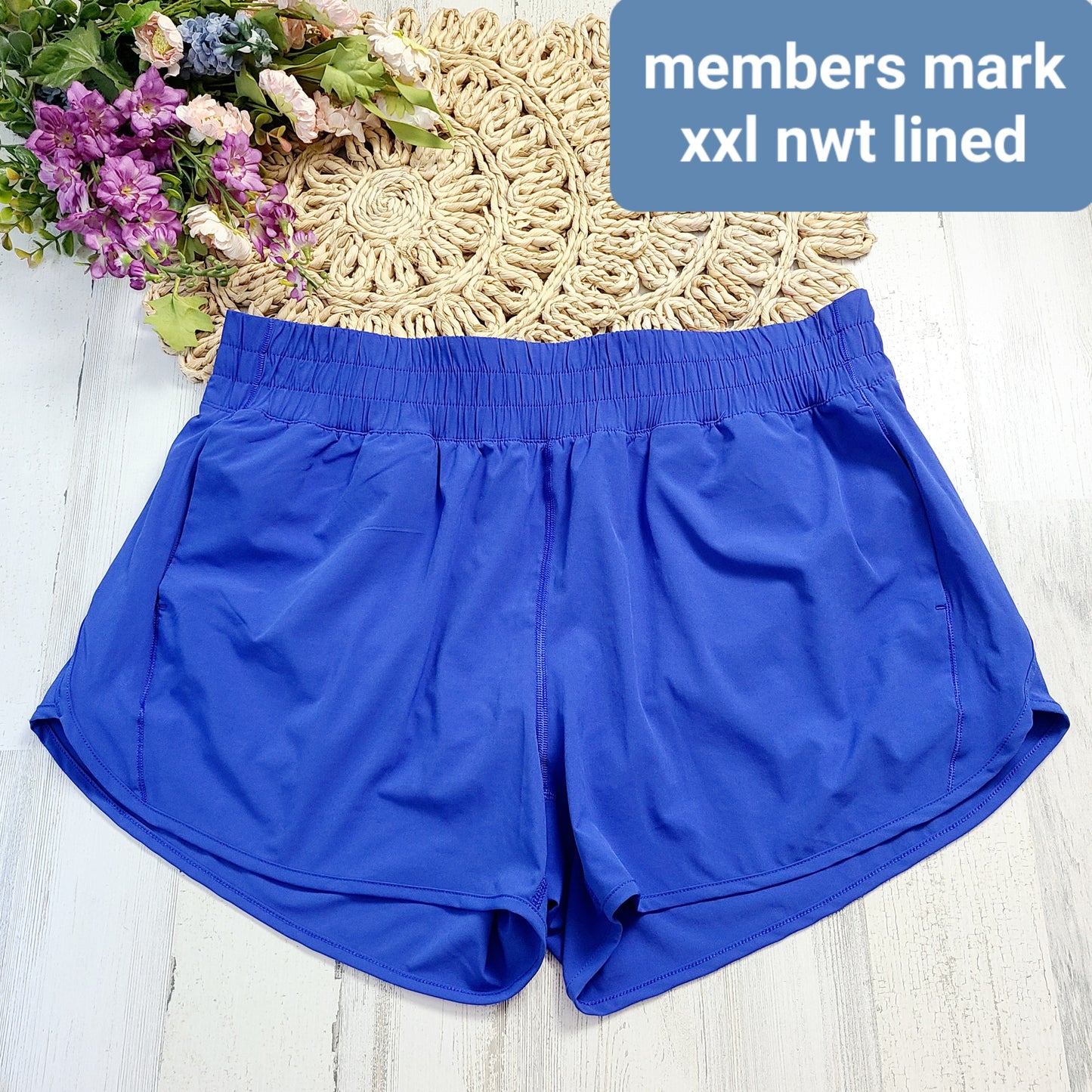 members mark new bright blue shorts