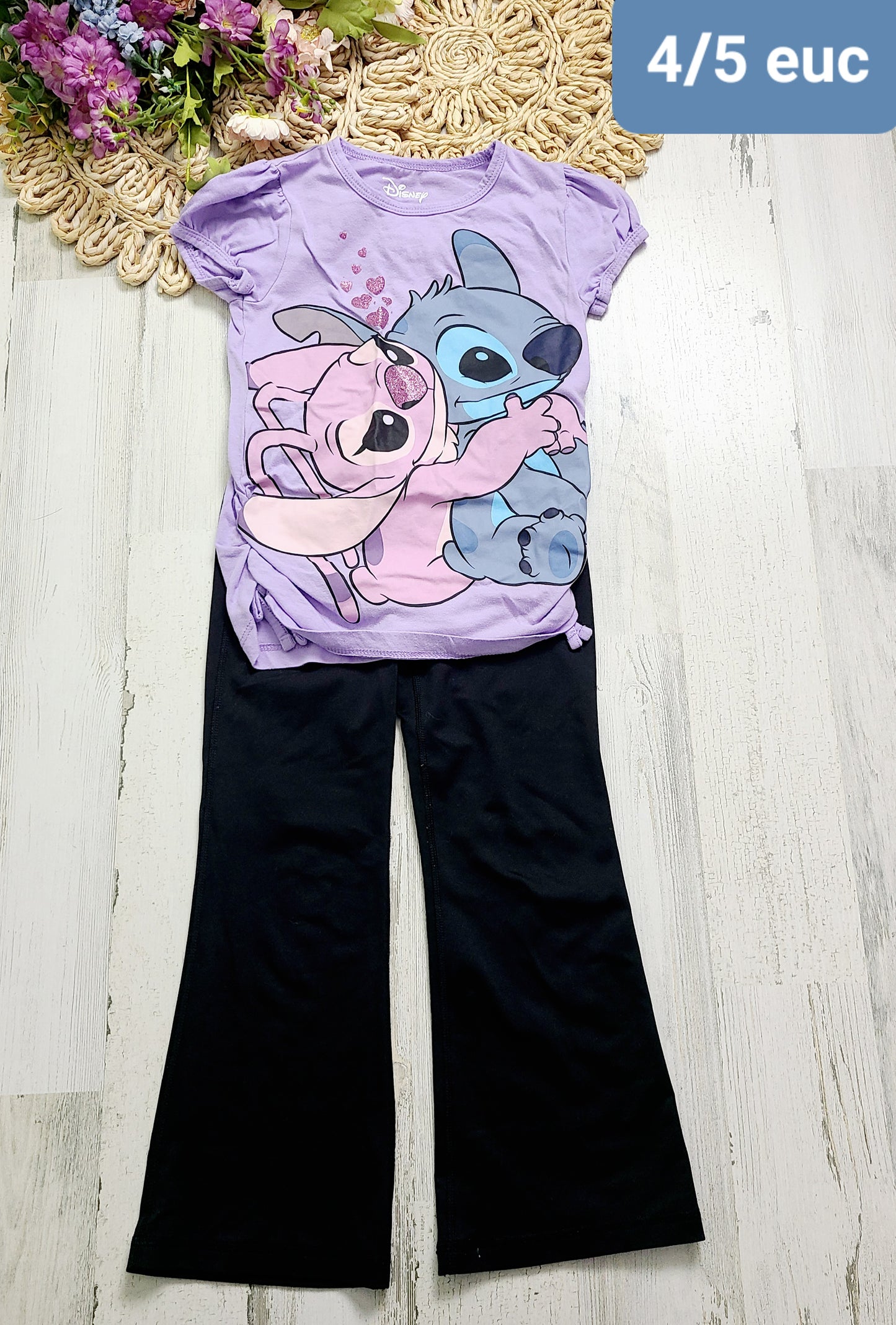 stitch tee and black pants