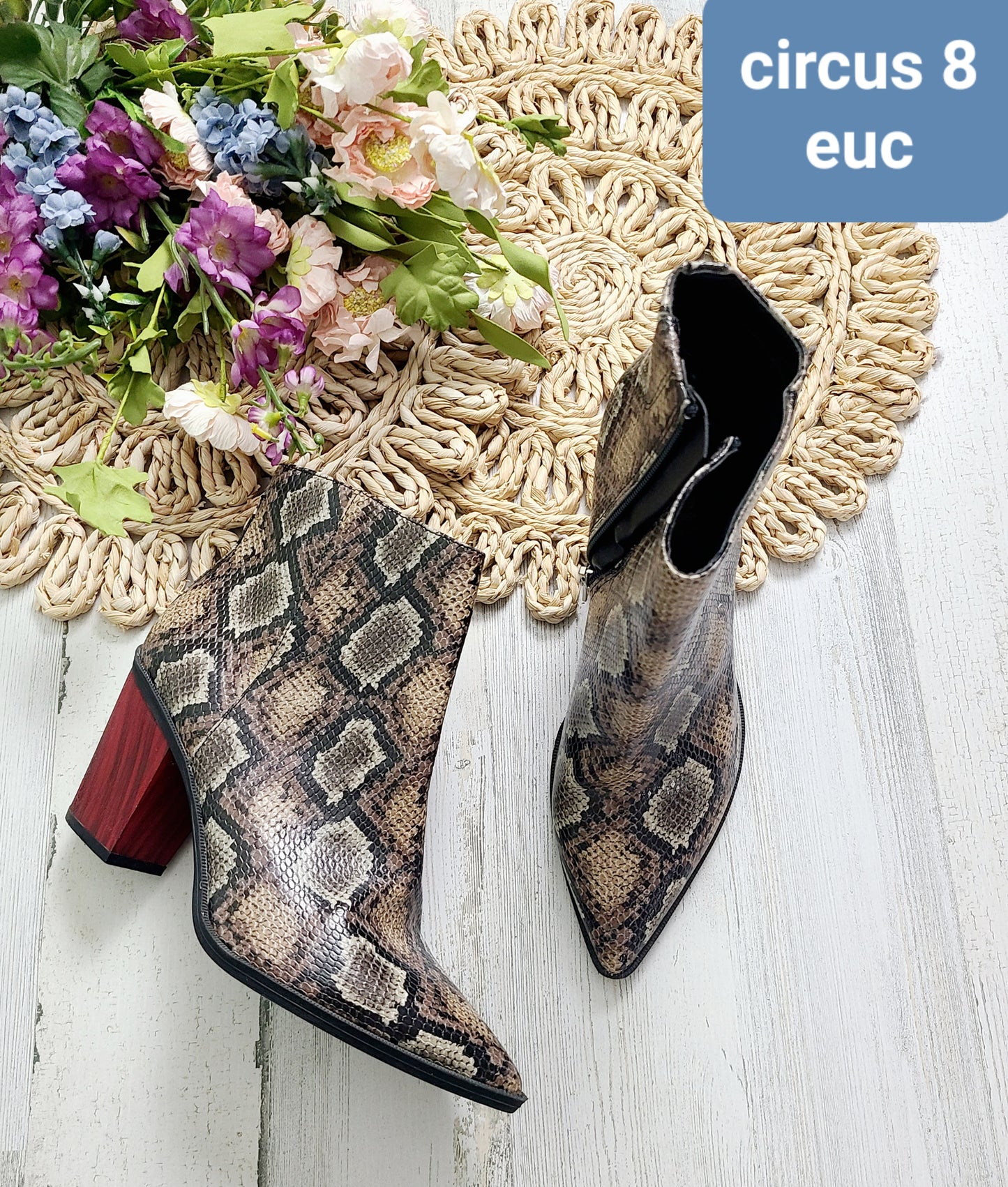 snake boots circus