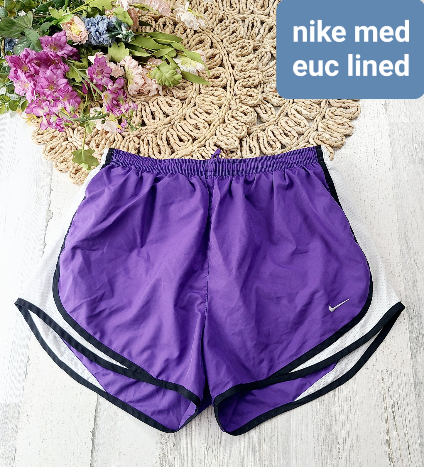 purple nike lined shorts