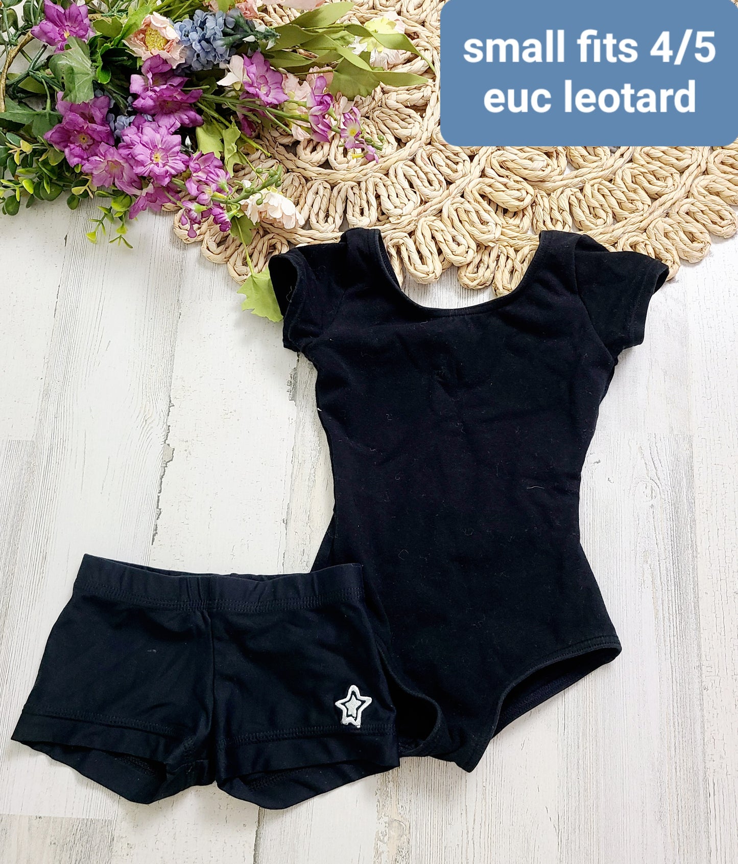 black leotard and shorts